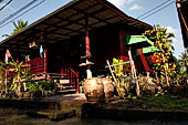 Scenery along the canal leading to Damnoen Saduak Floating Market. 